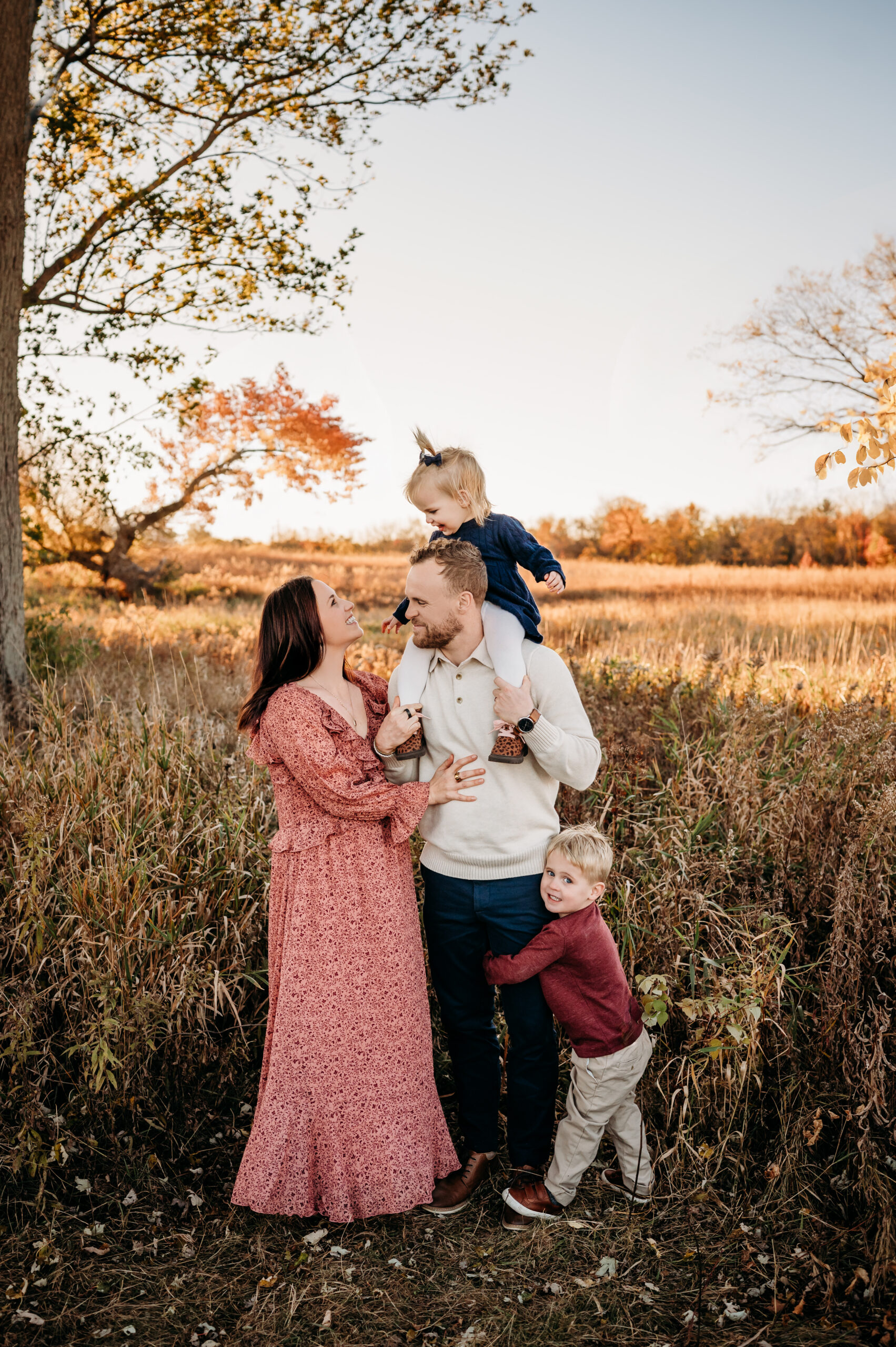 Outdoor family photography session in Barrington Illinois with parents and children during fall in a natural setting